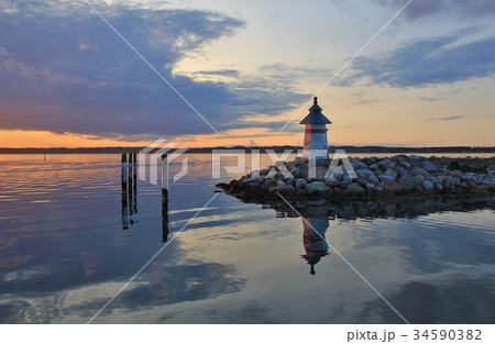 Sunset scene in the harbour of Ebeltoft, Denmark. 34590382