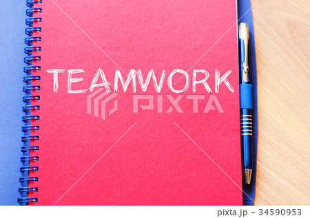 Teamwork write on notebook Teamwork write on notebook 34590953