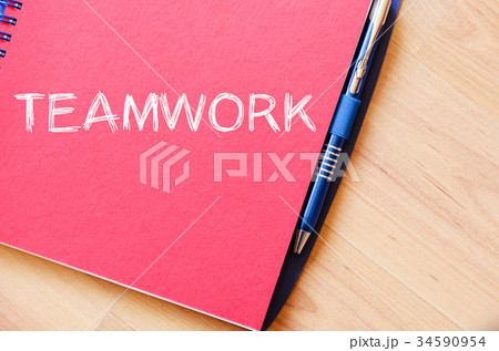 Teamwork write on notebook Teamwork write on notebook 34590954
