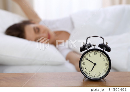Beautiful sleeping woman resting in bed and trying Beautiful sleeping woman resting in bed and trying 34592491