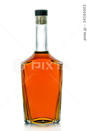 A bottle of brandy on a white background A bottle of brandy on a white background 34593003