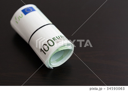 Roll of one hundred euro bills Roll of one hundred euro bills 34593063