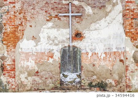Wooden cross in church ruins 34594416