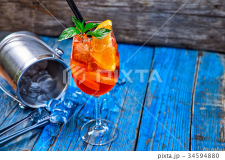 Spritz Aperol cocktail in wine glass Spritz Aperol cocktail in wine glass 34594880