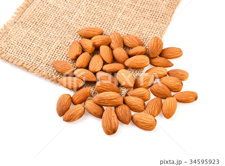 Almonds isolated on white background Almonds isolated on white background 34595923