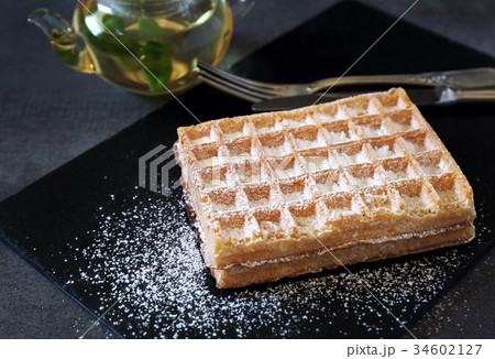 Belgian waffles and mint tea 34602127