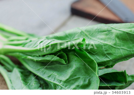 Leaves of kale on wooden. Leaves of kale on wooden. 34603913