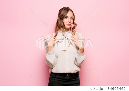 Surprised happy beautiful woman looking in Surprised happy beautiful woman looking in 34605462