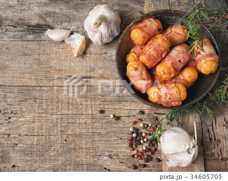 Bacon wrapped sausage 34605705
