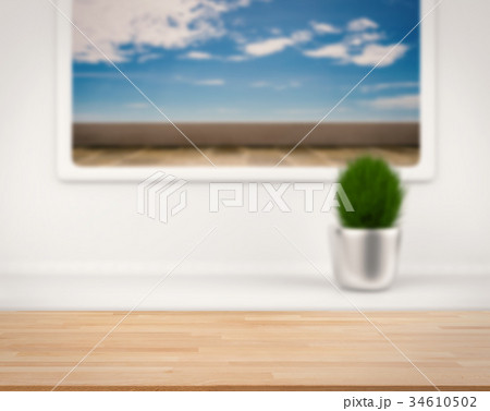 wooden counter with terrace view from window 34610502