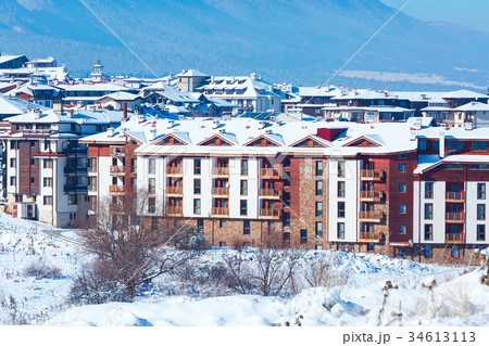 Houses and snow mountains in Bansko, Bulgaria Houses and snow mountains in Bansko, Bulgaria 34613113
