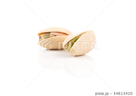 pistachio nut on white 34613420