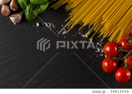 pasta, tomato, herbs and spices 34613439
