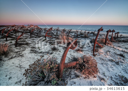 Sunset on the beach of Barril, cemetery of anchors Sunset on the beach of Barril, cemetery of anchors 34613615