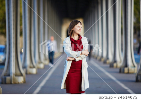 Woman in Paris on a bright fall day Woman in Paris on a bright fall day 34614075