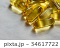 Fish oil supplement, medical and health concept 34617722