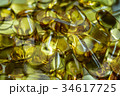 Fish oil supplement, medical and health concept 34617725
