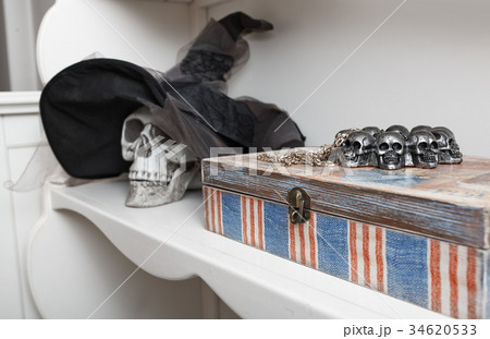 Human skull in a white cabinet. Halloween theme 34620533