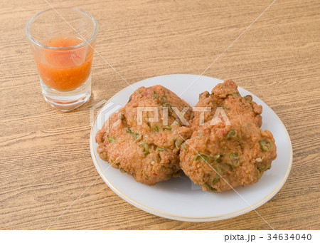 Thai Fish Cakes Served With Sweet Spicy Sauce 34634040
