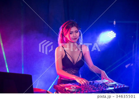 Young people are celebrating the night party entertainment. 34635501