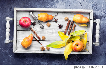 Autumn still life with an apple and a pear Autumn still life with an apple and a pear 34635591