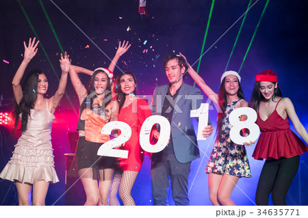 Young people are celebrating the night party entertainment. 34635771