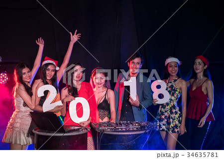 Young people are celebrating the night party entertainment. 34635781