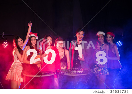 Young people are celebrating the night party entertainment. 34635782