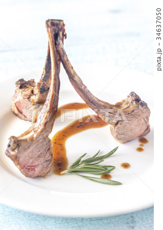 Grilled lamb rib chops on the plate 34637050