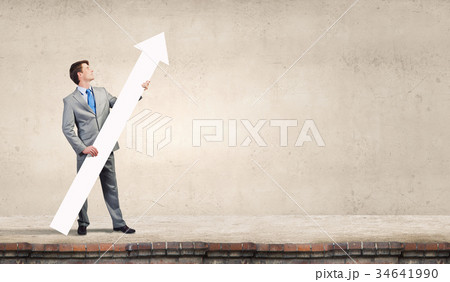 Man with arrow in his hands 34641990