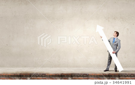 Man with arrow in his hands 34641991