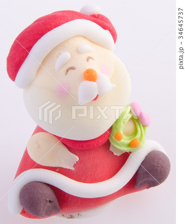 Santa Claus figurine on background Santa Claus figurine on background 34645737