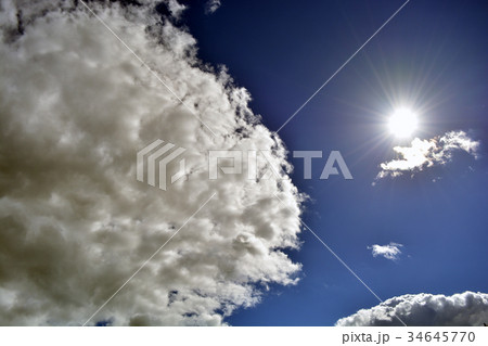 sun and clouds on blue sky sun and clouds on blue sky 34645770