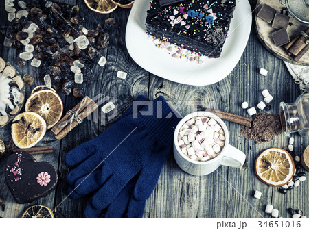 cup of hot chocolate and cookies among Cake 34651016