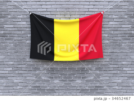 Belgium flag hanging on brick wall.  34652467