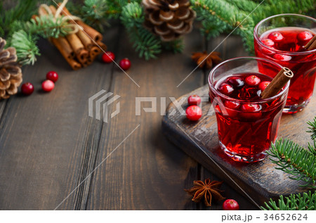 Cranberry drink on wooden background  34652624