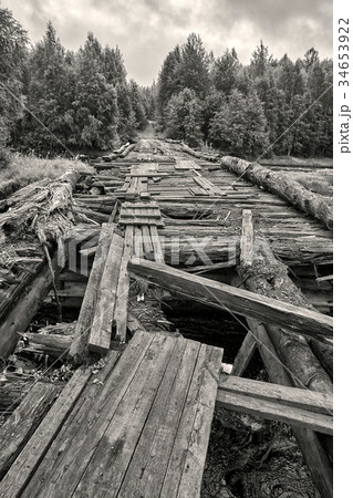 Destroyed wooden bridge across the river Suna in Destroyed wooden bridge across the river Suna in 34653922