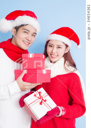 couple smile with merry christmas couple smile with merry christmas 34654361