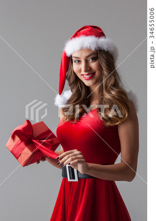 Santa Claus woman with gift Santa Claus woman with gift 34655006