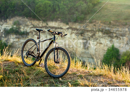 Mountain bike stands alone outdoor against autumn 34655978