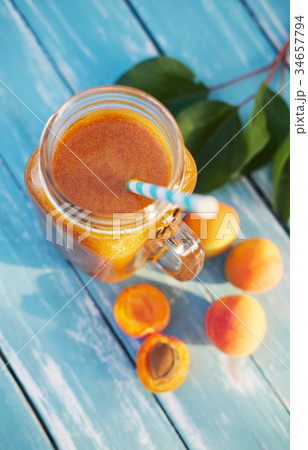 Glass of fresh apricot smoothie 34657794