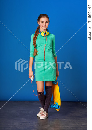 Sporty pretty teen girl loves sports. 34660445