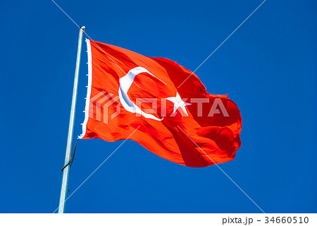 風にたなびくトルコ国旗の写真素材