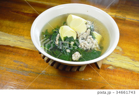 vegetable gourd with chop pork and egg tofu soup vegetable gourd with chop pork and egg tofu soup 34661743