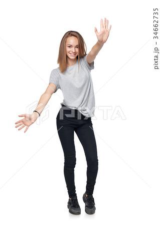 Teen girl showing thumb up sign Teen girl showing thumb up sign 34662735