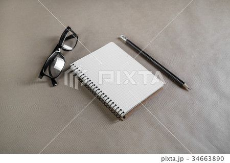 Notebook, pencil and glasses Notebook, pencil and glasses 34663890