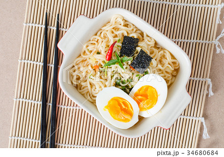 Instant noodles with boiled egg and seaweed 34680684
