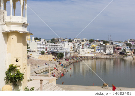 Hindu devotees pilgrims bathing in sacred Puskhar  34682403