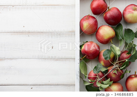 White wooden tray with fresh apples, autumn harvest 34686885