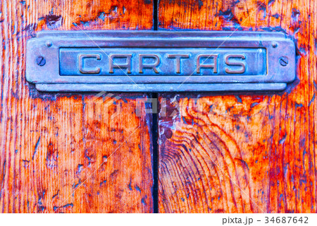Old letterbox in the door 34687642